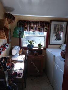 clothes washing area featuring independent washer and dryer