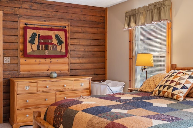 bedroom featuring rustic walls