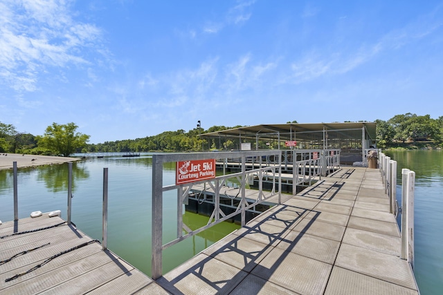 dock area featuring a water view