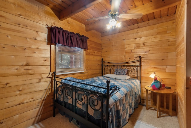 bedroom featuring wood walls, ceiling fan, light carpet, wooden ceiling, and beam ceiling