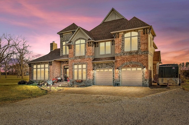 view of front of home with a garage