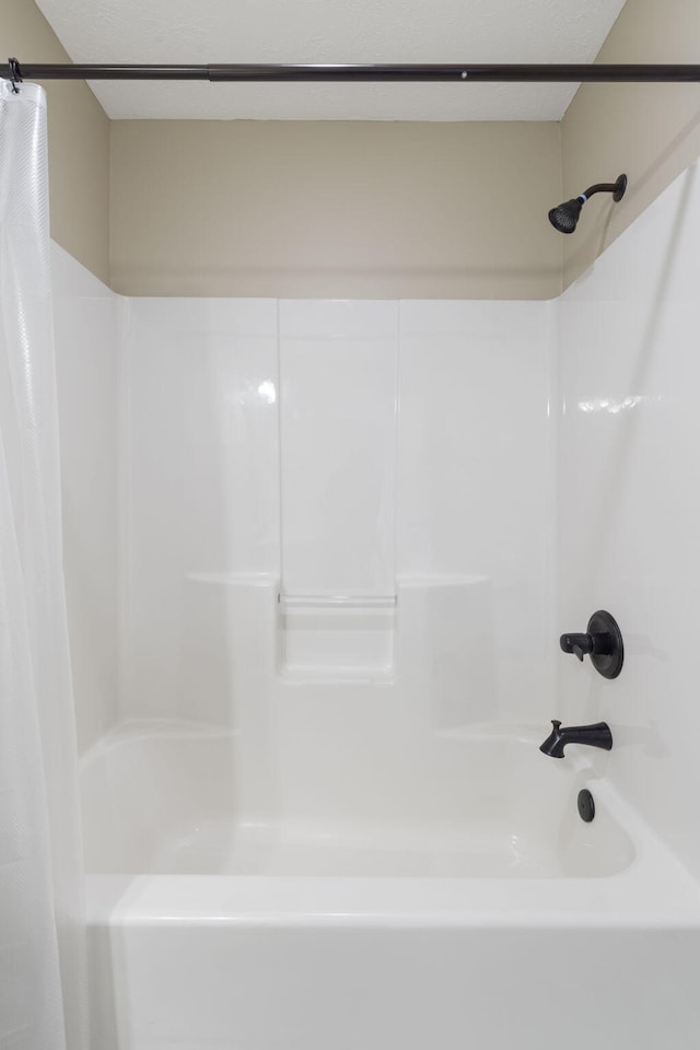 430 S Yellowwood Dr, Springfield, MO 65809 - bathroom featuring shower / bathtub combination with curtain
