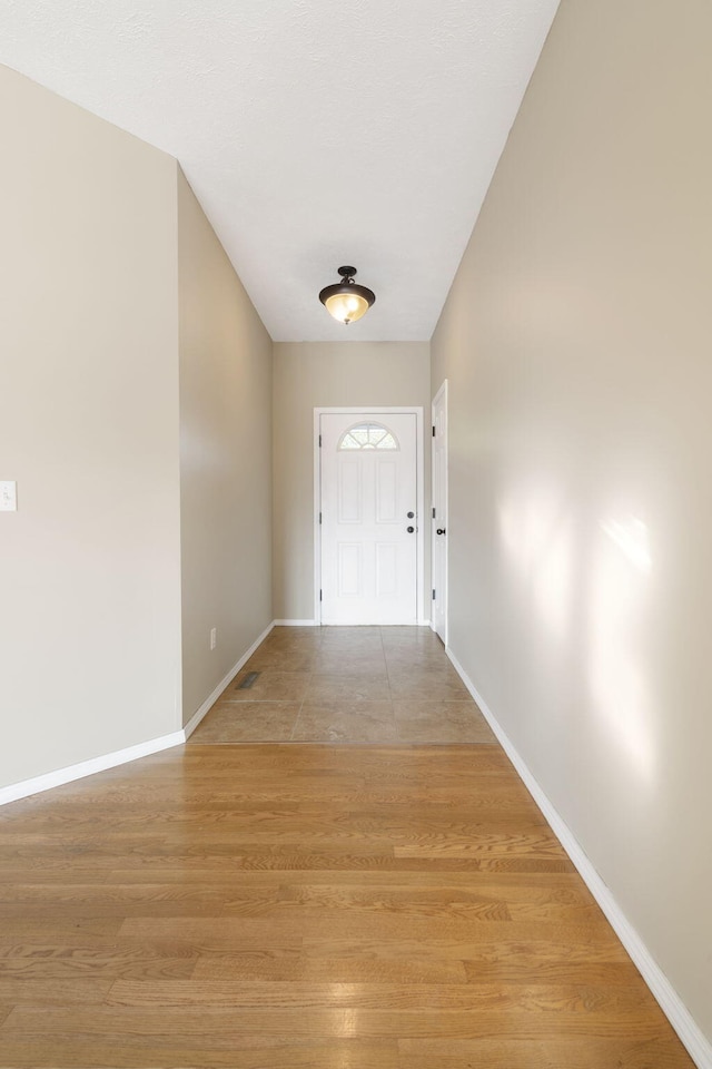 doorway featuring light hardwood / wood-style floors