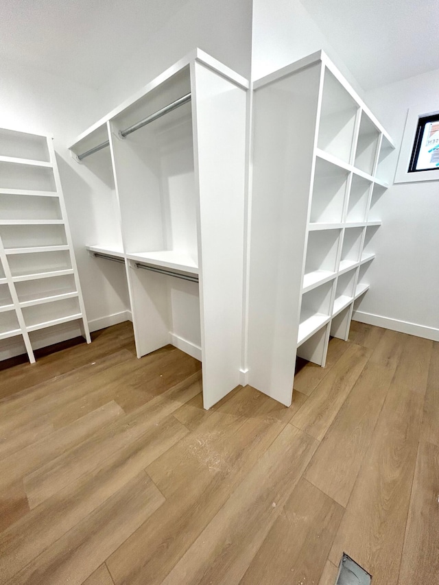 spacious closet with light wood-type flooring