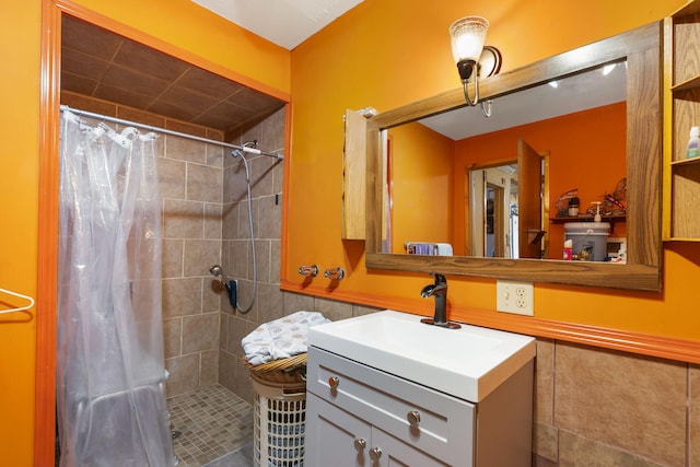 bathroom with vanity and walk in shower