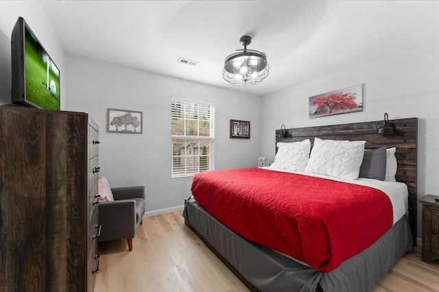 bedroom featuring light wood-type flooring