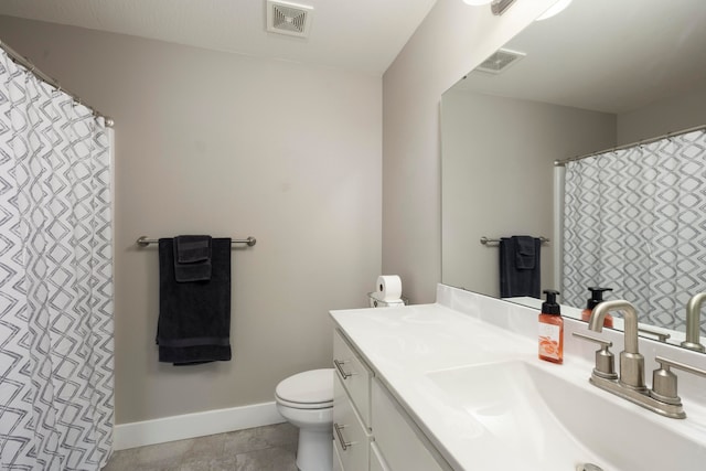 bathroom with vanity, a shower with shower curtain, tile patterned floors, and toilet