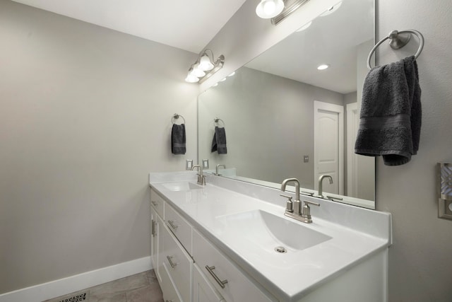 bathroom featuring vanity and tile patterned flooring