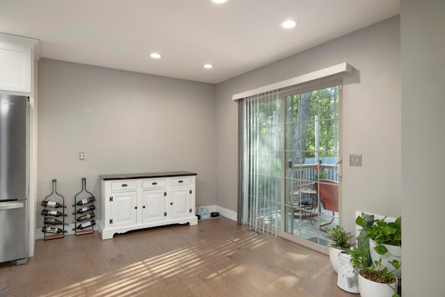 living area with dark hardwood / wood-style floors