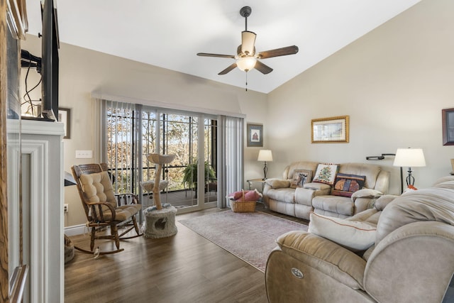 living room with ceiling fan, dark wood-type flooring, and lofted ceiling