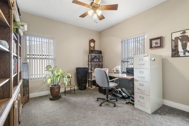 carpeted home office with ceiling fan