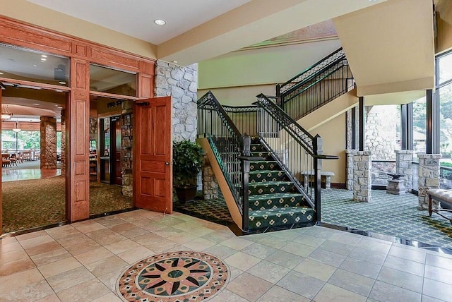 stairs featuring tile patterned floors