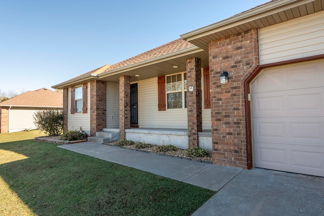 view of front facade with a front yard and a garage