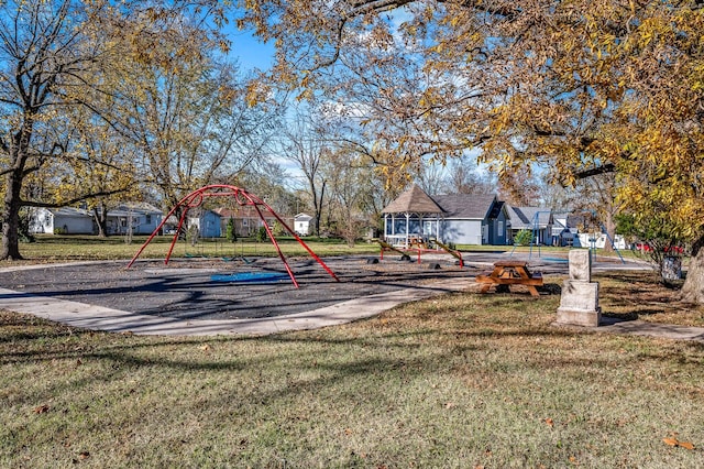 view of playground featuring a lawn