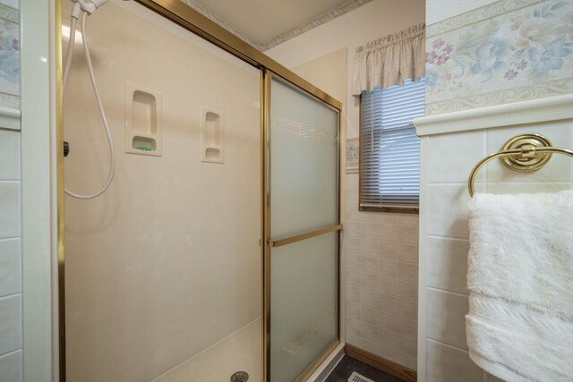 bathroom with an enclosed shower