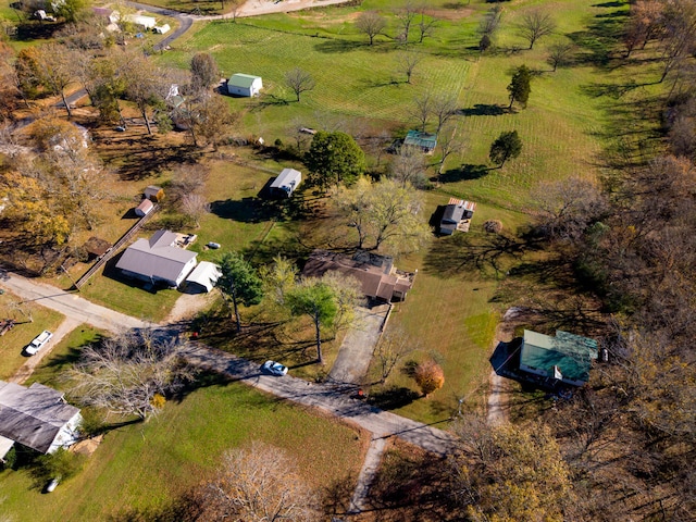 birds eye view of property featuring a rural view