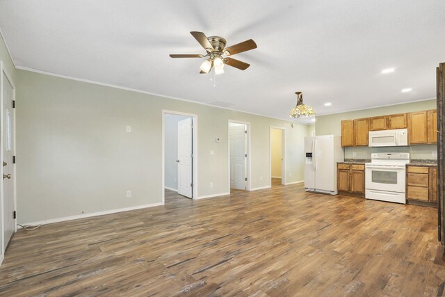 1259 Meadowview Rd, Galena, MO 65656 - kitchen featuring white appliances, ornamental molding, a ceiling fan, dark wood-style flooring, and baseboards