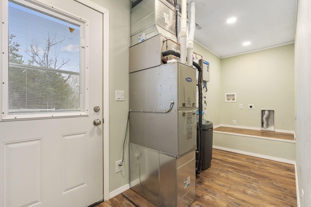 1259 Meadowview Rd, Galena, MO 65656 - washroom featuring hookup for an electric dryer, baseboards, wood finished floors, ornamental molding, and washer hookup