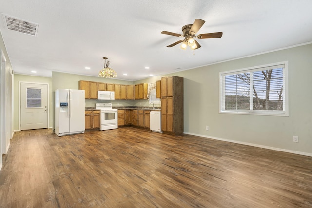 kitchen featuring dark hardwood / wood-style flooring, ornamental molding, white appliances, ceiling fan, and pendant lighting