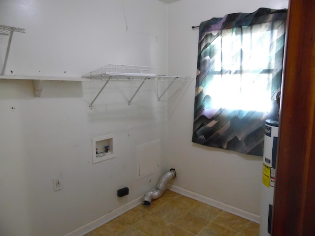 clothes washing area with washer hookup and water heater