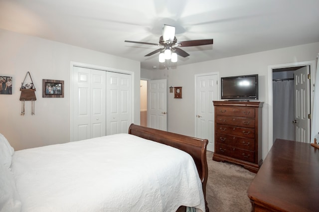 carpeted bedroom featuring ceiling fan