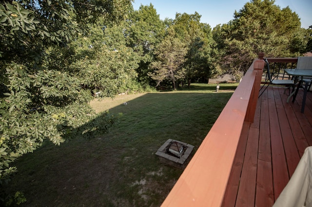 view of yard with a wooden deck