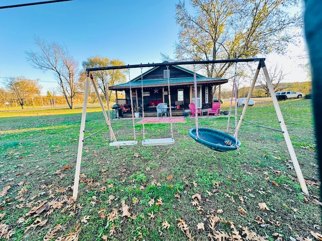 exterior space featuring a lawn and a patio