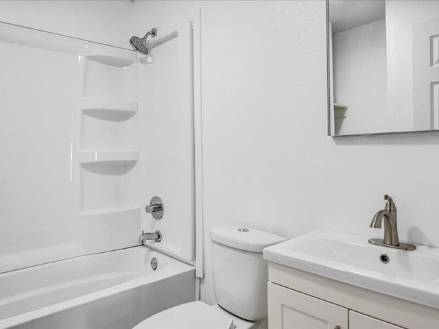 full bathroom with vanity, shower / bath combination, and toilet