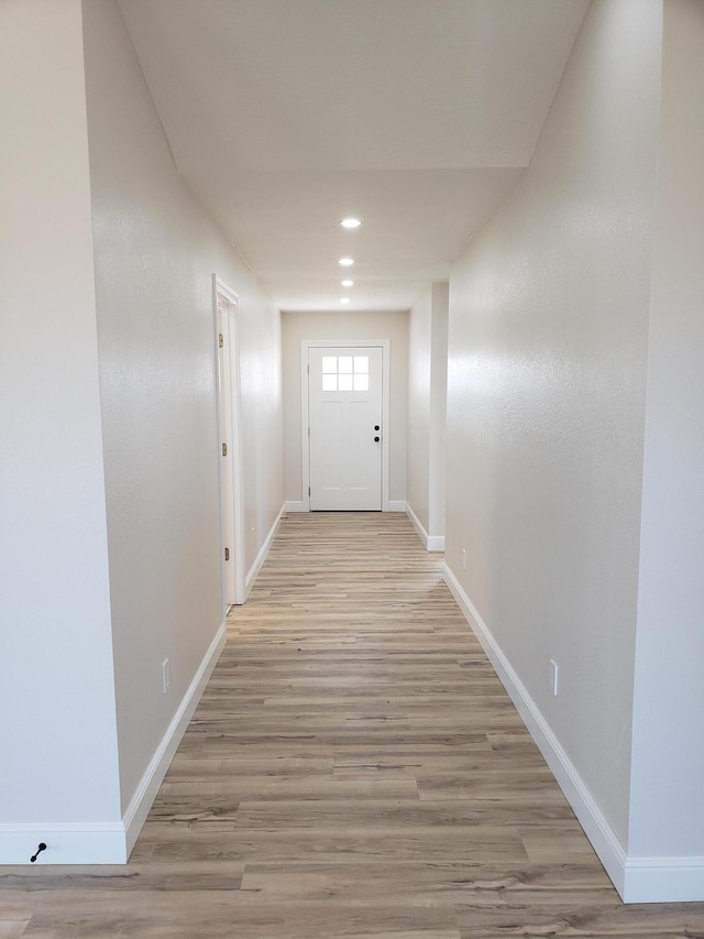 entryway with light hardwood / wood-style flooring