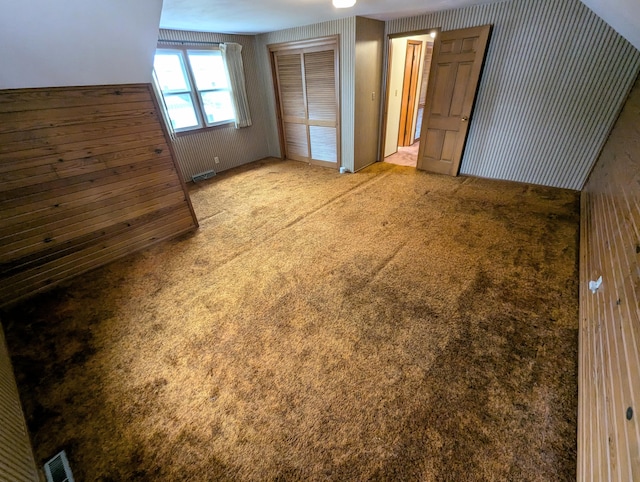 unfurnished bedroom featuring light colored carpet