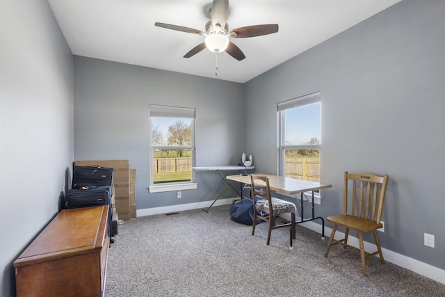 office space with carpet flooring and ceiling fan