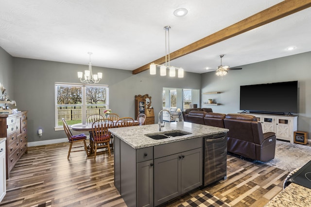 kitchen featuring light stone countertops, sink, wine cooler, dark hardwood / wood-style floors, and gray cabinets