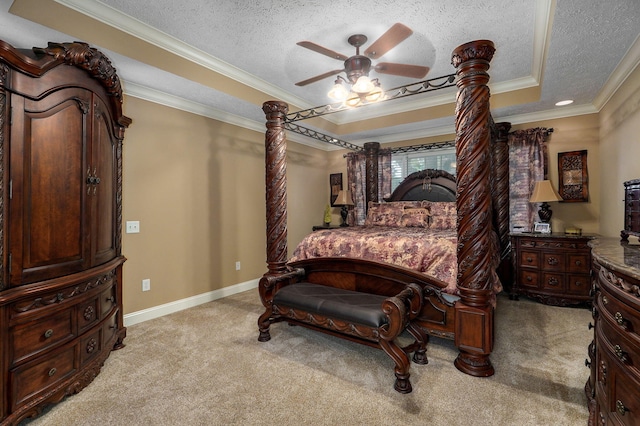 bedroom with light carpet, a textured ceiling, ceiling fan, and crown molding