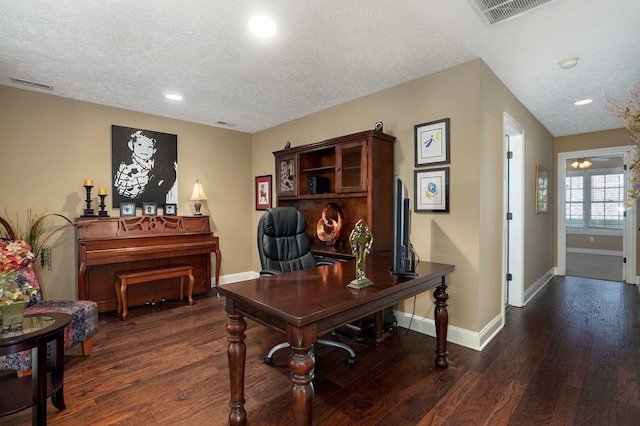 office featuring dark hardwood / wood-style flooring and a textured ceiling