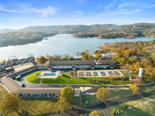 drone / aerial view with a water view