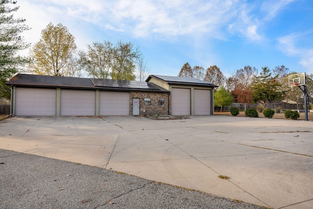 garage featuring solar panels