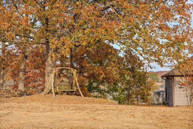 view of yard featuring central AC