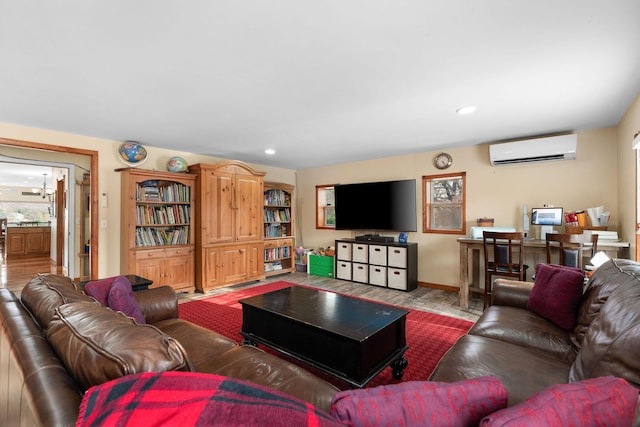 117 Kingdom St, Cape Fair, MO 65624 - living room with a wall unit AC, wood finished floors, recessed lighting, and baseboards