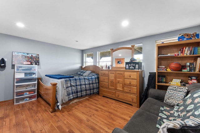 bedroom featuring hardwood / wood-style floors