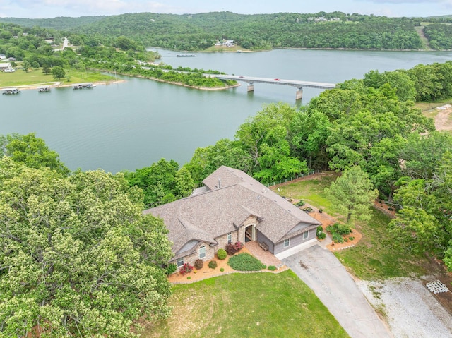 117 Kingdom St, Cape Fair, MO 65624 - view of subject property with a nearby body of water and a heavily wooded area