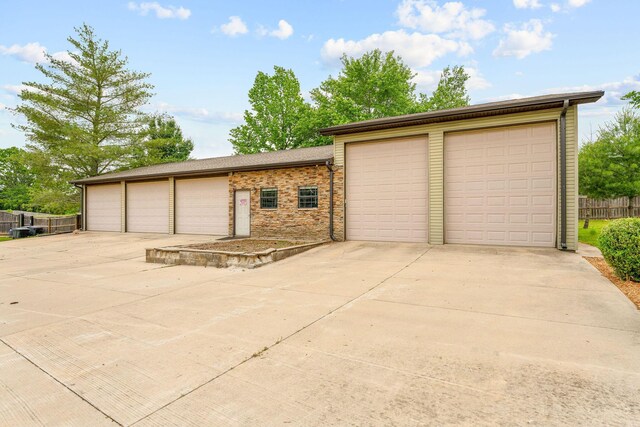 117 Kingdom St, Cape Fair, MO 65624 - detached garage featuring fence