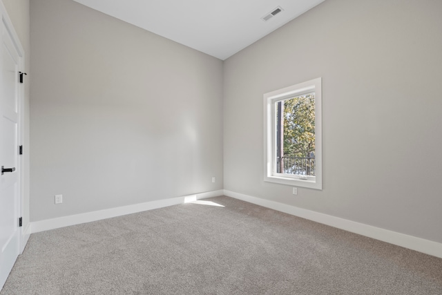 spare room with carpet flooring