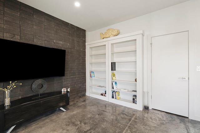 living room featuring concrete floors