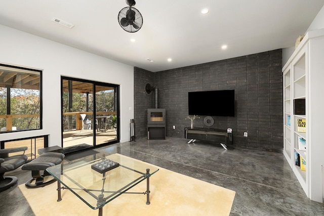 living room featuring a wood stove