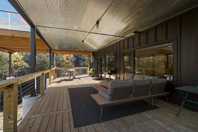 wooden deck with outdoor lounge area