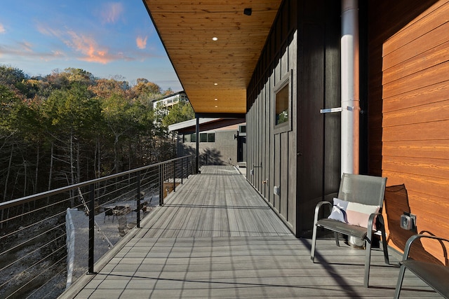 view of balcony at dusk