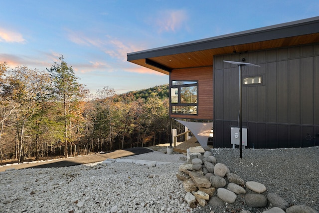 view of property exterior at dusk