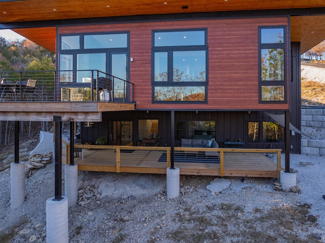 rear view of house with an outdoor living space