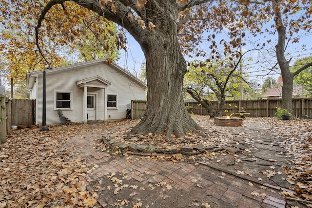 back of property featuring a patio area