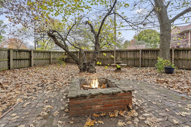 view of patio / terrace with a fire pit